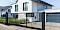 Zaunsysteme / Schiebetor Privatbereich, Haus im Hintergrund © ThomBal / fotolia.com